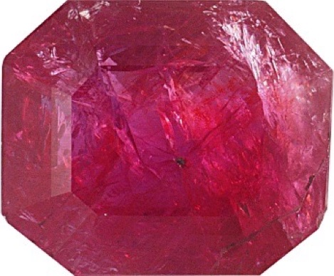 AN UNUSUAL FILLED RUBY, LIKELY OILED